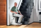 man-in-stannah-stairlift-solus-566x377